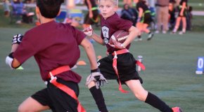 boys playing flag football